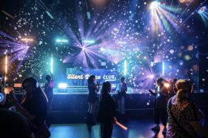 Bubbles and lights over the Silent Disco Club booth